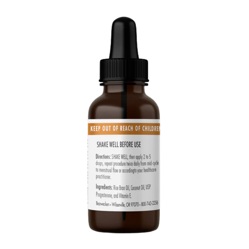 An amber glass dropper bottle with a black cap and a white label featuring orange and black text, shown on a plain white background.